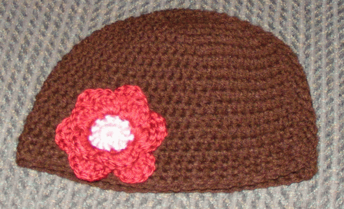 brownbeaniewithredflowerbaby.gif